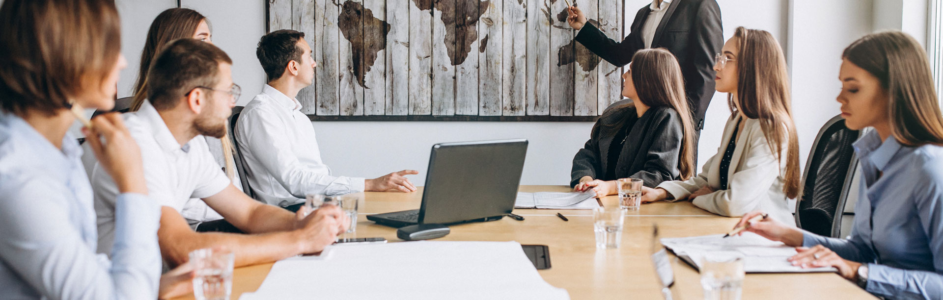 Business team reviewing plans together in a meeting
